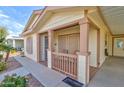 Inviting covered porch with seating, creating a welcoming entryway at 2263 N Trekell Rd # 81, Casa Grande, AZ 85122