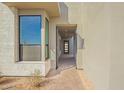 The front entrance of the house showing a decorative door and nice pavers at 5724 E Moura Dr, Cave Creek, AZ 85331