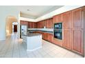 Well-equipped kitchen featuring a breakfast bar and modern appliances at 7722 E Fledgling Dr, Scottsdale, AZ 85255