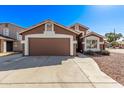 Charming single-Gathering home featuring a two-car garage and low maintenance desert landscaping at 19801 N 6Th Pl, Phoenix, AZ 85024
