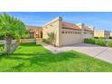 Charming single-Gathering home with tile roof, well-maintained landscaping, and attached two-car garage at 5505 E Mclellan Rd # 41, Mesa, AZ 85205