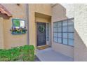 Charming home featuring a decorative wrought iron security door with a stylish wreath and 'Home Sweet Home' doormat at 5505 E Mclellan Rd # 41, Mesa, AZ 85205