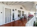 Inviting front porch with comfortable seating area, perfect for relaxing and enjoying the outdoors at 6960 W Peoria Ave # 29B, Peoria, AZ 85345