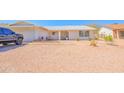 Inviting single-story home with low-maintenance desert landscaping and convenient front parking at 11816 S Winnebago St, Phoenix, AZ 85044