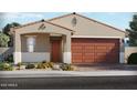 Charming single-story home featuring a two-car garage and desert landscaping at 17567 W Adams St, Goodyear, AZ 85338