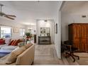 Spacious living room with tile floors seamlessly connecting to the dining area for easy entertaining at 19700 N 76Th St # 1124, Scottsdale, AZ 85255