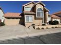 Charming two-story home featuring a tile roof, front yard, and two-car garage at 3758 E Ironwood Dr, Phoenix, AZ 85044