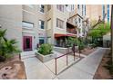 Exterior view with sidewalk, entry door, and wheelchair ramp into the building at 387 N 2Nd Ave # 2E, Phoenix, AZ 85003