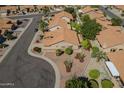 A lovely view of the home and neighborhood at 9130 W Rimrock Dr, Peoria, AZ 85382