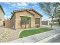 Charming single-story home with desert landscaping and neutral colors at 2093 N Illinois St, Chandler, AZ 85225