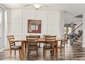 Bright dining room with wood floors, stylish furniture, and contemporary decor at 3213 W Desert Vista Trl, Phoenix, AZ 85083