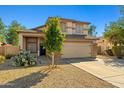 Charming two-story home with a neutral color palette, well-manicured landscaping and a two car garage at 3299 E Boston St, Gilbert, AZ 85295