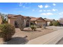 Lovely one-story home with low-maintenance desert landscaping and a three-car garage at 3663 E Camden Ave, San Tan Valley, AZ 85140