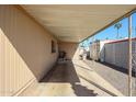 Spacious covered carport providing ample parking and protection from the elements at 7300 N 51St Ave # G142, Glendale, AZ 85301