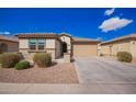 Charming single-story home with a well-maintained front yard and neutral color scheme at 8146 W Sands Rd, Glendale, AZ 85303