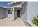 Stylish front door of the home showing modern design with clean lines and a welcoming entrance at 4402 E Montecito Ave, Phoenix, AZ 85018