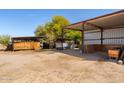Functional horse stalls with covered areas, providing shelter and comfort for animals at 836 W Lenora Way, San Tan Valley, AZ 85140