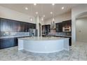 Bright kitchen with granite countertops, stainless steel appliances, mosaic backsplash and pendant lighting at 8504 S 30Th St, Phoenix, AZ 85042