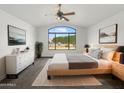 Cozy bedroom with a large window offering scenic views and a contemporary design at 1940 W Oriole Way, Chandler, AZ 85286