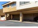 Exterior of multi-story condos showing parking areas and outdoor stairs at 2035 S Elm St # 218, Tempe, AZ 85282