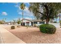 Quaint single-story home featuring low-maintenance landscaping and a cozy covered entrance at 501 E Hermosa Dr, Tempe, AZ 85282