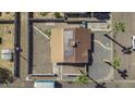 An aerial view of a private backyard including a roof with solar panels at 2921 W Luke Ave, Phoenix, AZ 85017