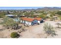 Desert home with a red tile roof, native plants and desert landscaping at 33810 N Smokehouse Trl, Cave Creek, AZ 85331