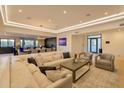 Bright living room boasts recessed lighting, hardwood flooring, and comfortable furniture at 7278 E Echo Ln, Scottsdale, AZ 85258
