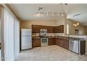 Well-equipped kitchen featuring stainless steel appliances and ample cabinet space at 30718 N Coral Bean Dr, San Tan Valley, AZ 85143