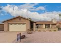 Beautiful single-Gathering home with a two-car garage and easy-to-maintain desert landscaping at 980 Leisure World --, Mesa, AZ 85206