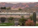 Scenic backyard view of mountains with desert landscaping at 12660 E Pivot Peak --, Gold Canyon, AZ 85118