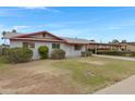 Quaint single-story home with a simple front yard and a covered carport at 1324 W 15Th St, Tempe, AZ 85281