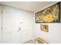 Bright foyer featuring a double door entry and neutral paint at 14266 N 2Nd Ave, Phoenix, AZ 85023