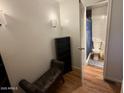 Bedroom featuring a bookshelf and a small leather bench at 150 S Windsor -- # A143, Mesa, AZ 85204