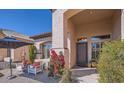 Inviting front entrance with comfortable seating area, lush landscaping, and neutral stucco finish at 1966 E Drake Dr, Tempe, AZ 85283