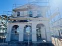 New construction home featuring scaffolding, showing the architectural detailing at 26029 N 23Rd Ave, Phoenix, AZ 85085