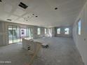 Unfinished living area ready for customization, featuring bright windows at 26029 N 23Rd Ave, Phoenix, AZ 85085