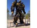 Unique statue of Bumble Bee built with car parts and displayed outside at 4033 E Wildcat Dr, Cave Creek, AZ 85331
