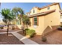 Home featuring low maintenance desert landscaping and pedestrian sidewalks at 5462 W Fulton St, Phoenix, AZ 85043