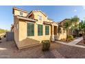 Home featuring a tile roof and low maintenance desert landscaping at 5462 W Fulton St, Phoenix, AZ 85043