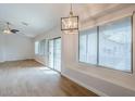 Bright, open living space with a pendant light and a built-in window seat at 15853 N 74Th Ave, Peoria, AZ 85382