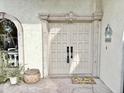 Elegant front entrance with decorative doors, creating a welcoming first impression at 6841 N 3Rd Pl, Phoenix, AZ 85012