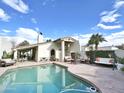 Inviting backyard pool and patio area, perfect for outdoor entertaining and relaxation at 6841 N 3Rd Pl, Phoenix, AZ 85012