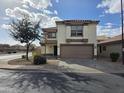 Two-story home featuring a desert landscape, and a two-car garage at 1044 S Mosley Dr, Chandler, AZ 85286