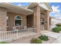 Attractive home featuring brick columns and arched windows, creating a welcoming facade at 1321 W Gardenia Ave, Phoenix, AZ 85021