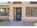 Welcoming front entrance with security door and views from the large front windows, including home address at 18823 N 41St Dr, Glendale, AZ 85308