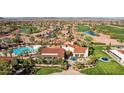 Beautiful aerial shot of the community center, golf course, and pool at 12915 W Micheltorena Dr, Sun City West, AZ 85375