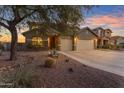 Charming single-Gathering home features a three-car garage and desert landscaping at 18187 E Via Jardin --, Gold Canyon, AZ 85118