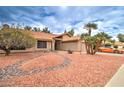 Charming single-story home displaying desert landscaping with a two-car garage at 372 W Larona Ln, Tempe, AZ 85284