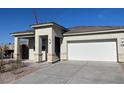 Beautiful single-Gathering home with a two-car garage, covered porch, and neutral exterior paint at 4919 S 106Th Ave, Tolleson, AZ 85353